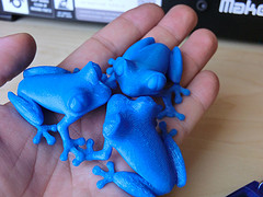 3D printed blue treefrogs in different layer t...